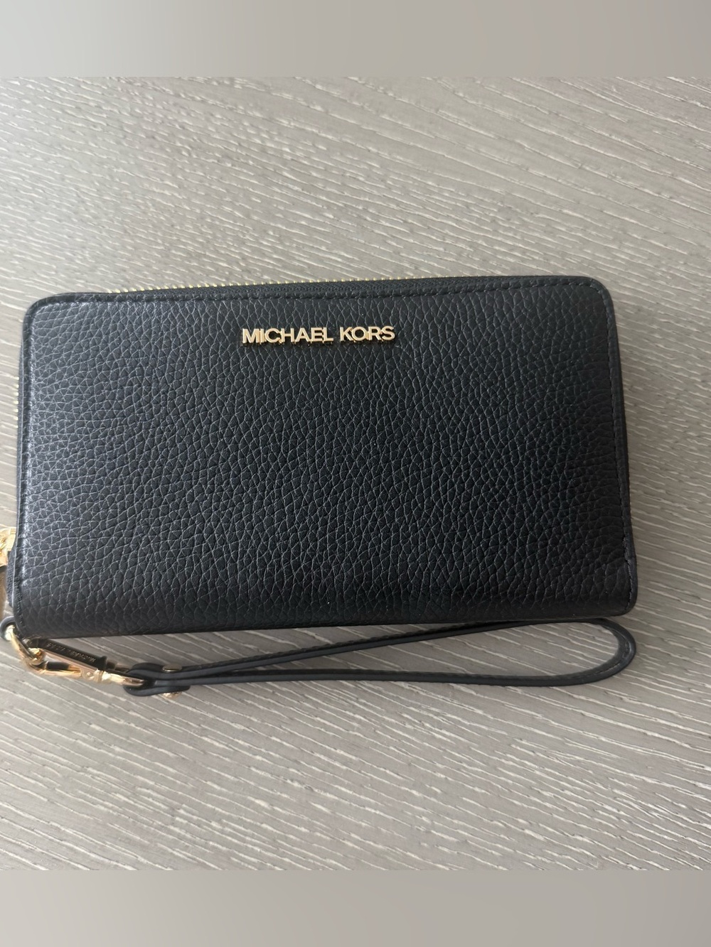 New Michael Kors Black Pebbled Leather Wrist Strap Wallet with Gold Logo